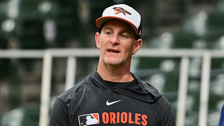 May 21, 2025; Milwaukee, Wisconsin, USA; Baltimore Orioles interim manager Tony Mansolino looks on during batting practice against the Milwaukee Brewers at American Family Field. Mandatory Credit: Benny Sieu-Imagn Images