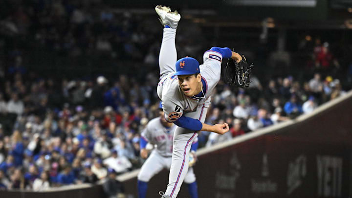 Sep 24, 2025; Chicago, Illinois, USA;  New York Mets pitcher Jonah Tong (21) throws pitch during the first inning against the Chicago Cubs at Wrigley Field. Mandatory Credit: Matt Marton-Imagn Images