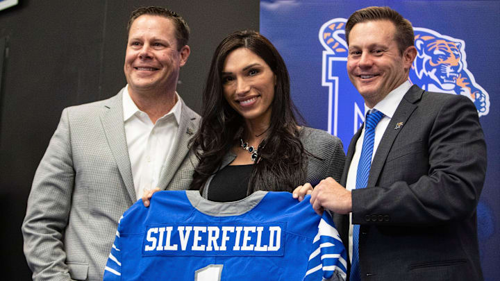 Memphis Director of Athletics Laird Veatch presents Memphis head football coach Ryan Silverfield and his wife Mariana Sliverfield with a team jersey at the Billy J. Murphy Football Complex on Friday, Dec. 13, 2019.

Ryan Silverfield Introduced As Memphis Next Football Coach