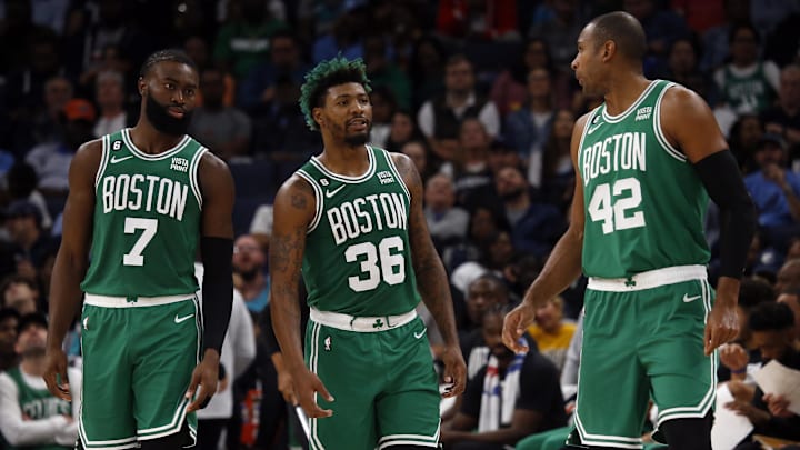 Boston Celtics guard Jaylen Brown (7) guard Marcus Smart (36).