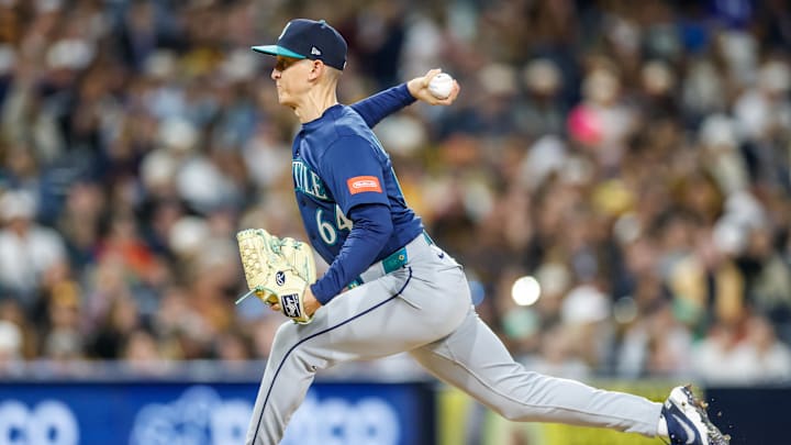 Apr 14, 2026; San Diego, California, USA; Seattle Mariners relief pitcher Casey Legumina (64) throws a pitch during the eighth inning against the San Diego Padres at Petco Park. Mandatory Credit: David Frerker-Imagn Images