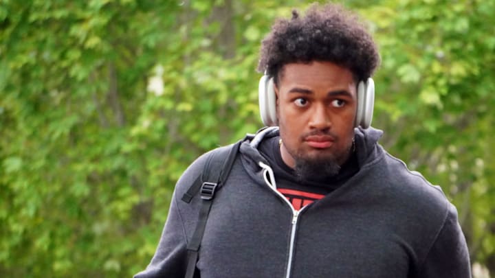 Ohio State football offensive lineman Josh Simmons checks into the team's hotel for fall camp in Grandview, Ohio, on Aug. 7, 2023.