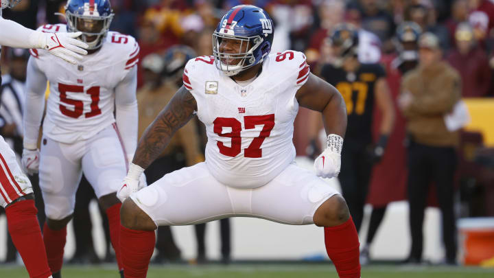 Nov 19, 2023; Landover, Maryland, USA; New York Giants defensive tackle Dexter Lawrence II (97) celebrates after a sack against the Washington Commanders during the second quarter at FedExField.  