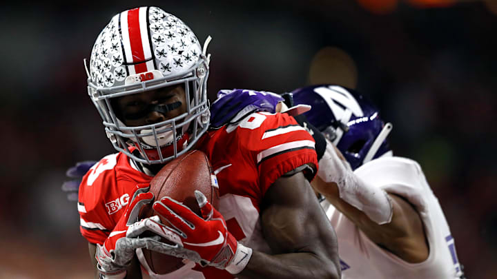 Dec 1, 2018; Indianapolis, IN, USA; Ohio State Buckeyes wide receiver Terry McLaurin (83) catches a pass for a touchdown against Northwestern Wildcats defensive back Greg Newsome II (29) in the first half in the Big Ten conference championship game at Lucas Oil Stadium. Mandatory Credit: Aaron Doster-Imagn Images