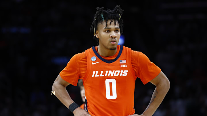 Mar 30, 2024; Boston, MA, USA; Illinois Fighting Illini guard Terrence Shannon Jr. (0) reacts against the Connecticut Huskies in the finals of the East Regional of the 2024 NCAA Tournament at TD Garden.