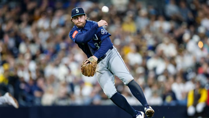 Brendan Donovan (33) throws to first base during the seventh inning against the San Diego Padres at Petco Park. 