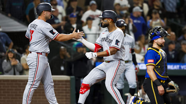 May 30, 2025; Seattle, Washington, USA; Minnesota Twins left fielder Willi Castro (50) celebrates with first baseman Ty France (13) after hitting a two-run home run against the Seattle Mariners during the ninth inning at T-Mobile Park.