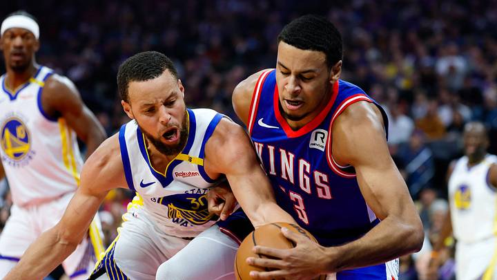 Feb 21, 2025; Sacramento, California, USA; Sacramento Kings forward Keegan Murray (13) and Golden State Warriors guard Stephen Curry (30) fight for a rebound during the first quarter at Golden 1 Center. Feb 21, 2025; Sacramento, California, USA; Sacramento Kings forward Keegan Murray (13) and Golden State Warriors guard Stephen Curry (30) fight for a rebound during the first quarter at Golden 1 Center.