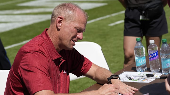 Apr 12, 2025; Tuscaloosa, AL, USA; Alabama head coach Kalen DeBoer signs autographs for fans following A-Day at Bryant-Denny Stadium. Mandatory Credit: Gary Cosby/USA TODAY NETWORK via Imagn Images