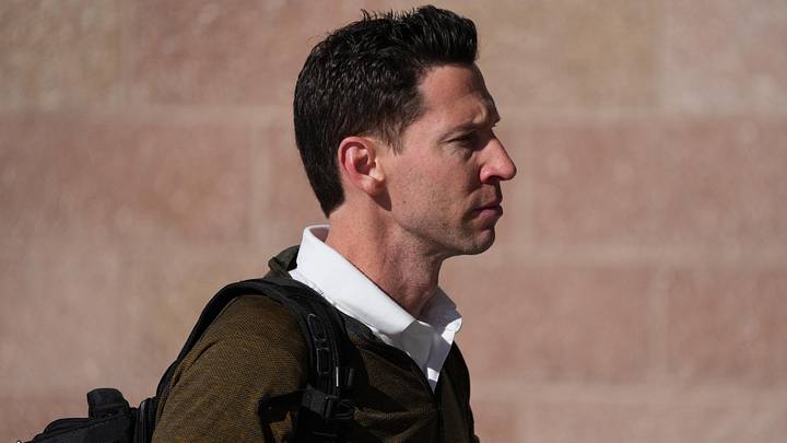 Mar 12, 2022; Mesa, AZ, USA; Boston Red Sox executive Craig Breslow arrives during a spring training workout at Sloan Park. Mandatory Credit: Joe Camporeale-Imagn Images