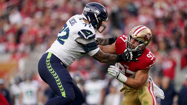 Dec 10, 2023; Santa Clara, California, USA; Seattle Seahawks offensive tackle Abraham Lucas (72) blocks San Francisco 49ers defensive end Nick Bosa (97) in the fourth quarter at Levi's Stadium. Mandatory Credit: Cary Edmondson-Imagn Images Dec 10, 2023; Santa Clara, California, USA; Seattle Seahawks offensive tackle Abraham Lucas (72) blocks San Francisco 49ers defensive end Nick Bosa (97) in the fourth quarter at Levi's Stadium. Mandatory Credit: Cary Edmondson-Imagn Images