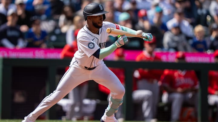 Seattle Mariners right fielder Samad Taylor bunts during a game against the Los Angeles Angels on April 30 at T-Mobile Park.