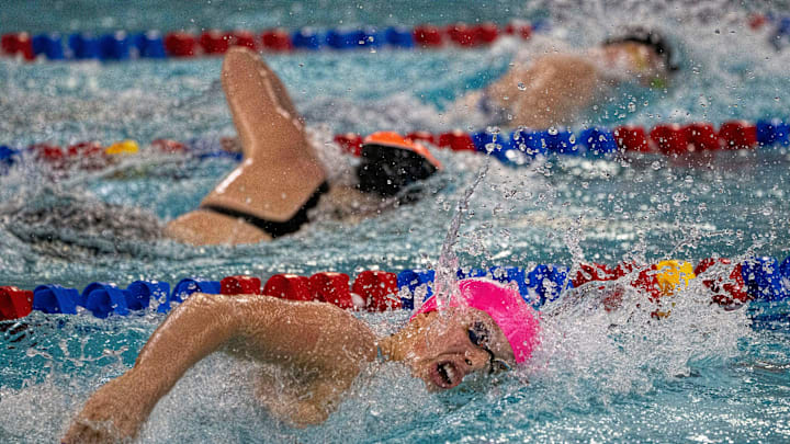 Perry's Quin Mahler-Moreno swims the 500-yard freestyle during the Iowa high school girls state swim meet at Marshalltown YMCA on Saturday, Nov. 16, 2024, in Marshalltown.
