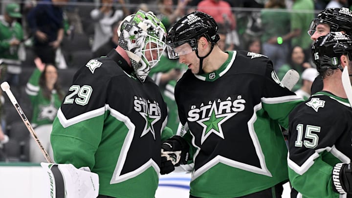 Apr 20, 2026; Dallas, Texas, USA; Dallas Stars goaltender Jake Oettinger (29) and right wing Mikko Rantanen (96) celebrate the win over the Minnesota Wild in game two of the first round of the 2026 Stanley Cup Playoffs at American Airlines Center. Mandatory Credit: Jerome Miron-Imagn Images