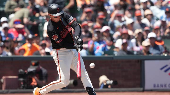 May 23, 2026; San Francisco, California, USA; San Francisco Giants catcher Daniel Susac (6) hits an RBI single against the Chicago White Sox during the fourth inning at Oracle Park. Mandatory Credit: Darren Yamashita-Imagn Images