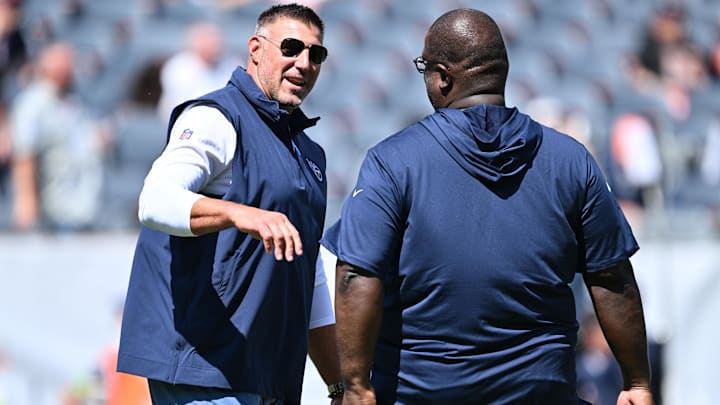 Aug 12, 2023; Chicago, Illinois, USA;  Tennessee Titans Head Coach Mike Vrabel talks with Assistant Head Coach Terrell Williams before a game against the Chicago Bears at Soldier Field. Mandatory Credit: Jamie Sabau-Imagn Images