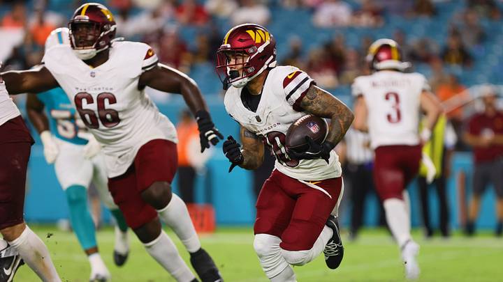 Aug 17, 2024; Miami Gardens, Florida, USA; Washington Commanders wide receiver Kazmeir Allen (10) runs with the football against the Miami Dolphins during the fourth quarter of a preseason game at Hard Rock Stadium. Mandatory Credit: Sam Navarro-USA TODAY Sports Aug 17, 2024; Miami Gardens, Florida, USA; Washington Commanders wide receiver Kazmeir Allen (10) runs with the football against the Miami Dolphins during the fourth quarter of a preseason game at Hard Rock Stadium. Mandatory Credit: Sam Navarro-USA TODAY Sports