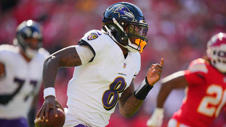 Sep 28, 2025; Kansas City, Missouri, USA;  Baltimore Ravens quarterback Lamar Jackson (8) scrambles during the first half against the Kansas City Chiefs at GEHA Field at Arrowhead Stadium. Mandatory Credit: Jay Biggerstaff-Imagn Images