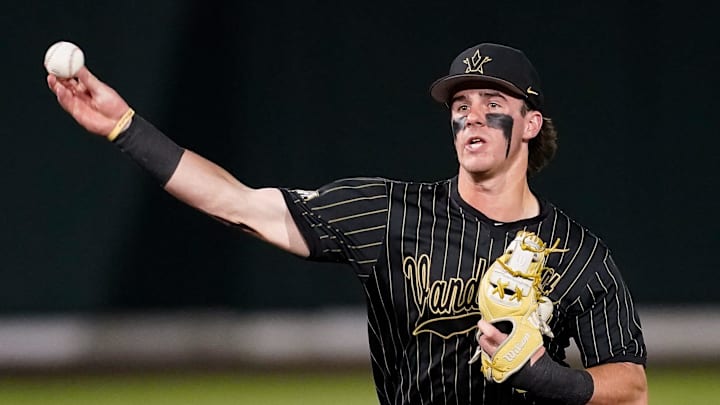 Vanderbilt second baseman Mike Mancini (5) fields a ground out hit by Arkansas right fielder Logan Maxwell during the sixth inning at Hawkins Field in Nashville, Tenn., Friday, March 28, 2025.