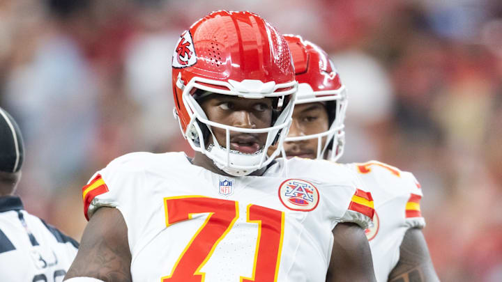 Aug 9, 2025; Glendale, Arizona, USA; Kansas City Chiefs offensive tackle Josh Simmons (71) against the Arizona Cardinals during a preseason NFL game at State Farm Stadium. Mandatory Credit: Mark J. Rebilas-Imagn Images