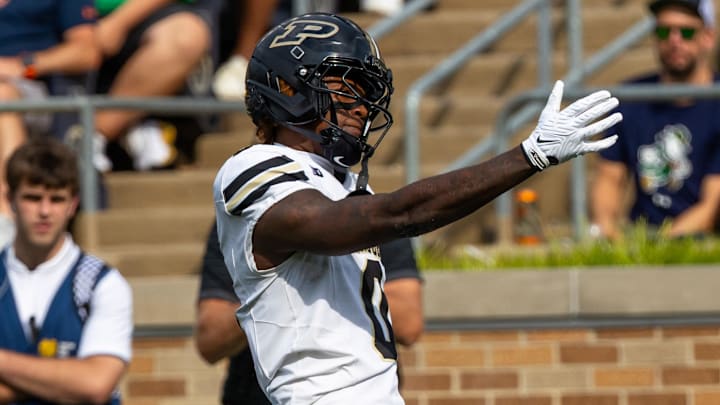 Purdue Boilermakers wide receiver Nitro Tuggle (0) celebrates a first down 