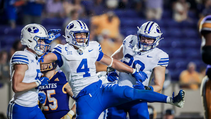 BYU RB LJ Martin celebrates a touchdown run against ECU