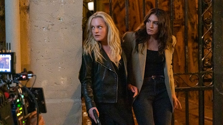 The Veil, FX on Hulu -- Pictured (L-R): Elisabeth Moss as Imogen Salter, Yumna Marwan as Adilah El Idrissi. CR: Christine Tamalet/FX