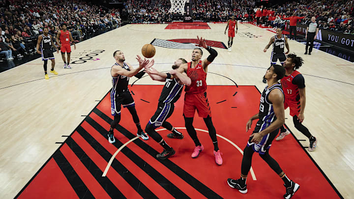 Feb 6, 2025; Portland, Oregon, USA: Sacramento Kings forward Domantas Sabonis (11) and Portland Trail Blazers forward Toumani Camara (33) battle for control of a rebound during the second half at Moda Center. Mandatory Credit: Troy Wayrynen-Imagn Images Feb 6, 2025; Portland, Oregon, USA: Sacramento Kings forward Domantas Sabonis (11) and Portland Trail Blazers forward Toumani Camara (33) battle for control of a rebound during the second half at Moda Center. Mandatory Credit: Troy Wayrynen-Imagn Images