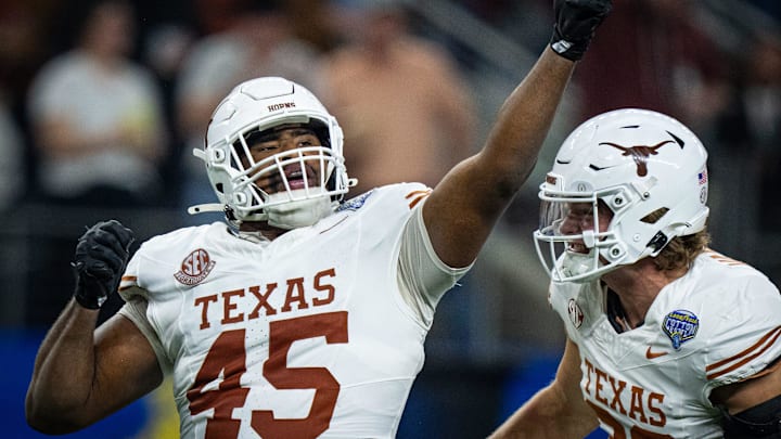 Texas Longhorns defensive lineman Vernon Broughton (45) celebrates a quarterback sack in the third quarter as the Texas Longhorns play the Ohio State Buckeyes in the Cotton Bowl College Football Playoff semi-final at AT&T Stadium in Dallas, Texas, Jan. 10, 2025.