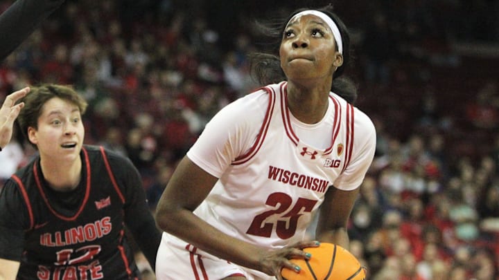 Wisconsin's Serah Williams (25) looks for her shot during a WNIT game at the Kohl Center in Madison, Wisconsin on Thursday March 28, 2024. Wisconsin's Serah Williams (25) looks for her shot during a WNIT game at the Kohl Center in Madison, Wisconsin on Thursday March 28, 2024.