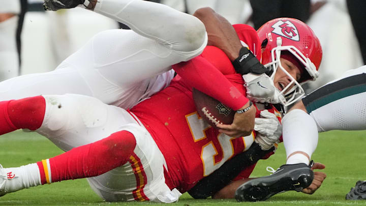 Sep 14, 2025; Kansas City, Missouri, USA; Philadelphia Eagles defensive tackle Moro Ojomo (97) sacks Kansas City Chiefs quarterback Patrick Mahomes (15) during the fourth quarter of the game at GEHA Field at Arrowhead Stadium. Mandatory Credit: Denny Medley-Imagn Images Sep 14, 2025; Kansas City, Missouri, USA; Philadelphia Eagles defensive tackle Moro Ojomo (97) sacks Kansas City Chiefs quarterback Patrick Mahomes (15) during the fourth quarter of the game at GEHA Field at Arrowhead Stadium. Mandatory Credit: Denny Medley-Imagn Images