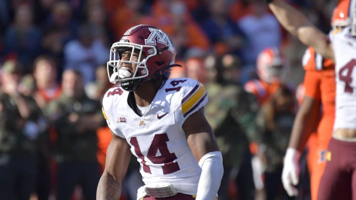 Nov 2, 2024; Champaign, Illinois, USA;  Minnesota Golden Gophers defensive back Kerry Brown (14) celebrates a stop against the Illinois Fighting Illini during the second half at Memorial Stadium. Mandatory Credit: Ron Johnson-Imagn Images