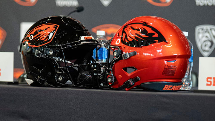 Oregon State football helmets sit on a table before the introductory press conference of the hiring of its new head football coach, JaMarcus Shephard, at Reser Stadium on Tuesday, Dec. 2, 2025, in Corvallis, Ore.