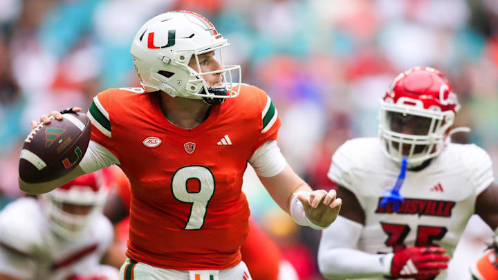 Nov 18, 2023; Miami Gardens, Florida, USA; Miami Hurricanes quarterback Tyler Van Dyke (9) looks for
