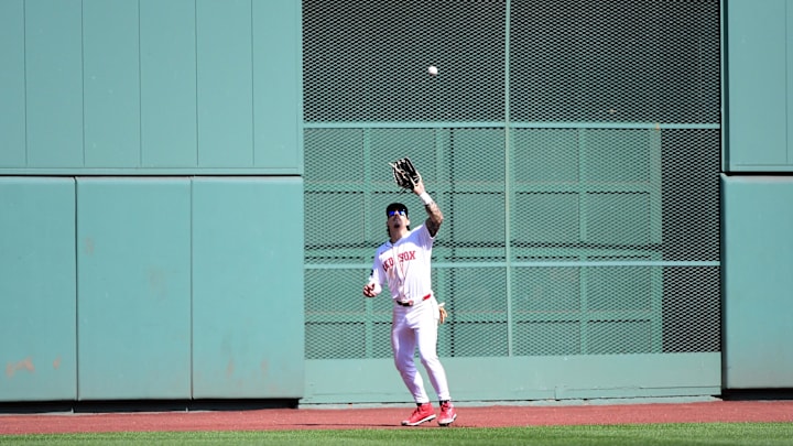 Sep 8, 2024; Boston, Massachusetts, USA;  Boston Red Sox center fielder Jarren Duran (16) makes a catch for an out during the fourth inning against the Chicago White Sox at Fenway Park. Mandatory Credit: Bob DeChiara-Imagn Images