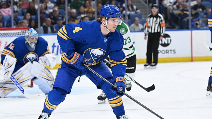 Apr 15, 2026; Buffalo, New York, USA; Buffalo Sabres defenseman Bowen Byram (4) clears the puck from the goal against the Dallas Stars in the third period at KeyBank Center. Mandatory Credit: Mark Konezny-Imagn Images Apr 15, 2026; Buffalo, New York, USA; Buffalo Sabres defenseman Bowen Byram (4) clears the puck from the goal against the Dallas Stars in the third period at KeyBank Center. Mandatory Credit: Mark Konezny-Imagn Images
