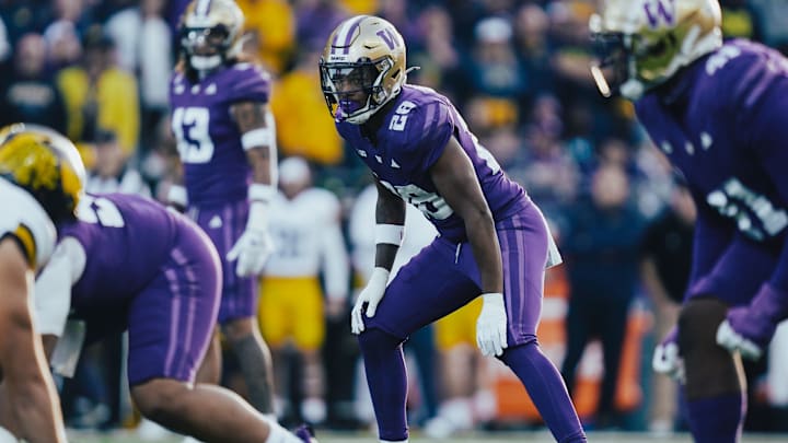 Khmori House started five games as a freshman linebacker for the Huskies. 