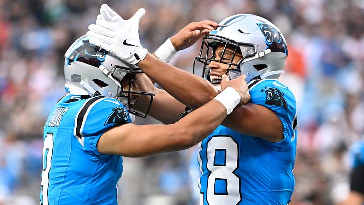 Carolina Panthers wide receiver Jalen Coker (18) celebrates with quarterback Bryce Young (9) after a touchdown catch in the first quarter at Bank of America Stadium. Mandatory Credit: Bob Donnan-Imagn Images Carolina Panthers wide receiver Jalen Coker (18) celebrates with quarterback Bryce Young (9) after a touchdown catch in the first quarter at Bank of America Stadium. Mandatory Credit: Bob Donnan-Imagn Images
