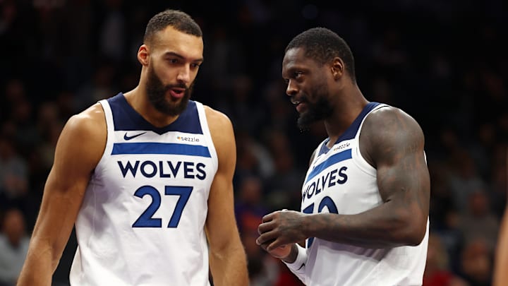 Minnesota Timberwolves center Rudy Gobert (27) and forward Julius Randle against the Phoenix Suns at Footprint Center in Phoenix on Jan. 29, 2025.