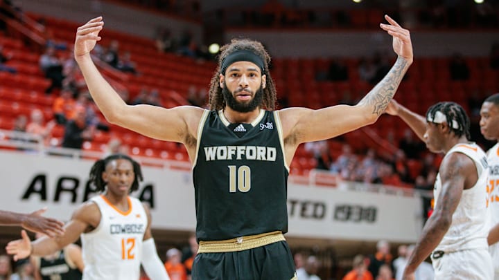 Dec 20, 2023; Stillwater, Oklahoma, USA; Wofford Terriers guard Corey Tripp (10) reacts after a play