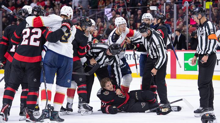 Florida Panthers' Sam Bennett takes a penalty for slashing following a scuffle between Brady Tkachuk and Ottawa Senators center Ridly Greig in the second period at the Canadian Tire Centre.  Mandatory Credit: Marc DesRosiers-Imagn