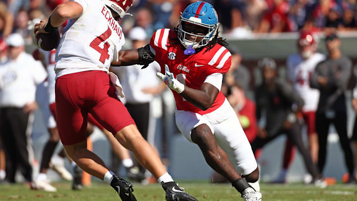 Oct 11, 2025; Oxford, Mississippi, USA; Mississippi Rebels linebacker Princewill Umanmielen (1) sacks Washington State Cougars quarterback Zevi Eckhaus (4) during the fourth quarter at Vaught-Hemingway Stadium. Mandatory Credit: Petre Thomas-Imagn Images