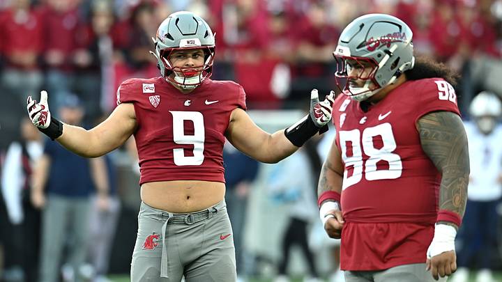 Washington State Cougars defensive end Matyus McLain (9) tries to get the crowd to cheer against the Arizona Wildcats during the first half at Gesa Field at Martin Stadium. 