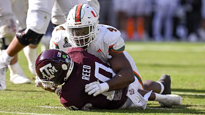 Dec 20, 2025; College Station, TX, USA; Miami Hurricanes defensive lineman Rueben Bain Jr. (4) sacks Texas A&M Aggies quarterback Marcel Reed (10) during the game between the Aggies and the Hurricanes at Kyle Field. Mandatory Credit: Jerome Miron-Imagn Images Dec 20, 2025; College Station, TX, USA; Miami Hurricanes defensive lineman Rueben Bain Jr. (4) sacks Texas A&M Aggies quarterback Marcel Reed (10) during the game between the Aggies and the Hurricanes at Kyle Field. Mandatory Credit: Jerome Miron-Imagn Images