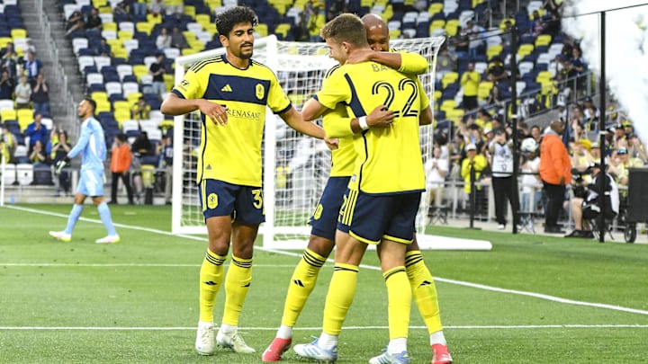 Nashville SC forward Teal Bunbury (12) celebrates the goal of defender Josh Bauer (22) against the Chattanooga Red Wolves  