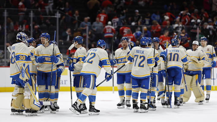 Feb 27, 2025; Washington, District of Columbia, USA; St. Louis Blues players celebrate after their game against the Washington Capitals at Capital One Arena. Mandatory Credit: Geoff Burke-Imagn Images