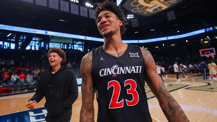 Nov 23, 2024; Atlanta, Georgia, USA; Cincinnati Bearcats forward Dillon Mitchell (23) celebrates after a victory over the Georgia Tech Yellow Jackets at McCamish Pavilion. Mandatory Credit: Brett Davis-Imagn Images
Nov 23, 2024; Atlanta, Georgia, USA; Cincinnati Bearcats forward Dillon Mitchell (23) celebrates after a victory over the Georgia Tech Yellow Jackets at McCamish Pavilion. Mandatory Credit: Brett Davis-Imagn Images