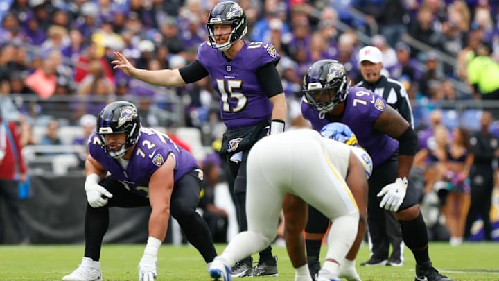 Oct 12, 2025; Baltimore, Maryland, USA; Baltimore Ravens quarterback Cooper Rush (15) calls a play at the line of scrimmage against the Los Angeles Rams during the first quarter of the game at M&T Bank Stadium. Mandatory Credit: Peter Casey-Imagn Images Oct 12, 2025; Baltimore, Maryland, USA; Baltimore Ravens quarterback Cooper Rush (15) calls a play at the line of scrimmage against the Los Angeles Rams during the first quarter of the game at M&T Bank Stadium. Mandatory Credit: Peter Casey-Imagn Images