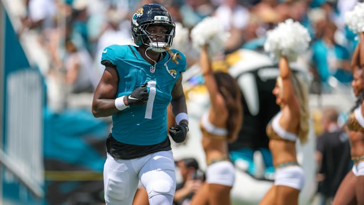 Sep 7, 2025; Jacksonville, Florida, USA; Jacksonville Jaguars running back Travis Etienne Jr. (1) takes the field prior to a game against the Carolina Panthers during the first half at EverBank Stadium. Mandatory Credit: Nathan Ray Seebeck-Imagn Images Sep 7, 2025; Jacksonville, Florida, USA; Jacksonville Jaguars running back Travis Etienne Jr. (1) takes the field prior to a game against the Carolina Panthers during the first half at EverBank Stadium. Mandatory Credit: Nathan Ray Seebeck-Imagn Images