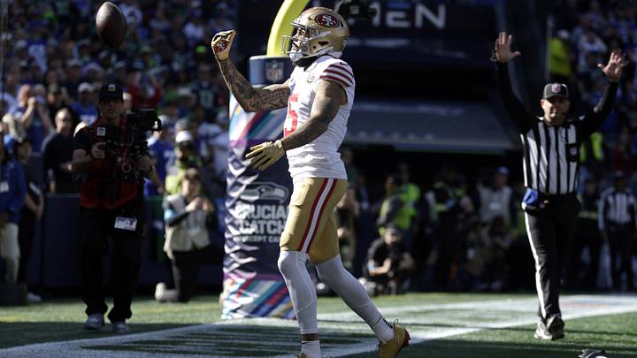 Oct 11, 2026; Seattle, Washington, USA; San Francisco 49ers wide receiver Mike Evans (5) celebrates after catching a two-yard touchdown pass from quarterback Brock Purdy (not pictured) against the Seattle Seahawks at Lumen Field. Mandatory Credit: Joe Nicholson-Imagn Images Oct 11, 2026; Seattle, Washington, USA; San Francisco 49ers wide receiver Mike Evans (5) celebrates after catching a two-yard touchdown pass from quarterback Brock Purdy (not pictured) against the Seattle Seahawks at Lumen Field. Mandatory Credit: Joe Nicholson-Imagn Images